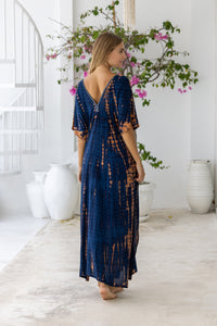 womens oversize maxi length tie dye kaftan in ink black and featuring a hand beaded neckline, pull tie detail and side pockets


