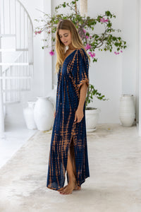 womens oversize maxi length tie dye kaftan in ink black and featuring a hand beaded neckline, pull tie detail and side pockets


