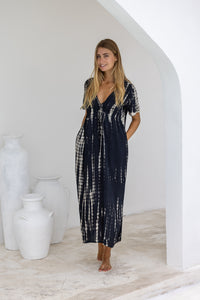 womens full length tie dye summer dress in black featuring a hand beaded v neckline, pull ties under the bust, short sleeves, pockets and side splits