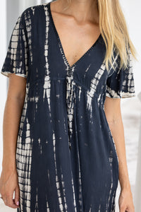 womens full length tie dye summer dress in black featuring a hand beaded v neckline, pull ties under the bust, short sleeves, pockets and side splits