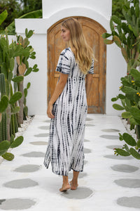 womens full length tie dye summer dress in black featuring a hand beaded v neckline, pull ties under the bust, short sleeves, pockets and side splits