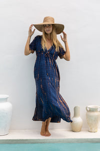 womens full length tie dye summer dress in black featuring a hand beaded v neckline, pull ties under the bust, short sleeves, pockets and side splits