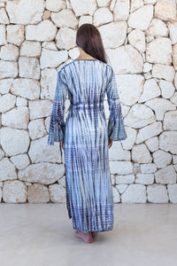 Womens full length tie dye summer dress in dark grey featuring a hand beaded v neckline, pull ties under the bust, trumpet sleeves and side splits
