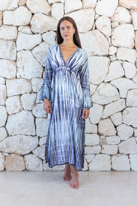 Womens full length tie dye summer dress in dark grey featuring a hand beaded v neckline, pull ties under the bust, trumpet sleeves and side splits