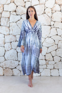 Womens full length tie dye summer dress in dark grey featuring a hand beaded v neckline, pull ties under the bust, trumpet sleeves and side splits