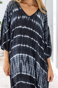 womens mid length oversize tie dye dress in black and cream featuring a hand beaded v neckline, 3/4 length sleeves and pockets