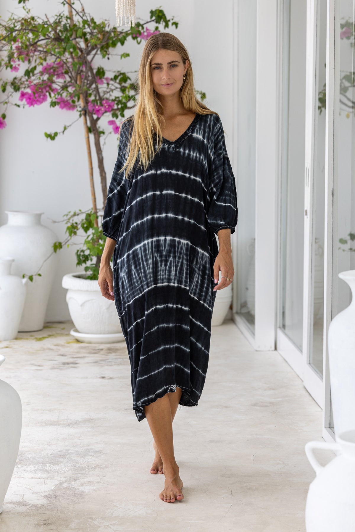 womens mid length oversize tie dye dress in ink black featuring a hand beaded v neckline, 3/4 length sleeves and pockets