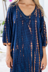 womens mid length oversize tie dye dress in navy blue and brown featuring a hand beaded v neckline, 3/4 length sleeves and pockets
