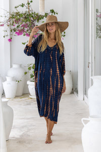 womens mid length oversize tie dye dress in navy blue and brown featuring a hand beaded v neckline, 3/4 length sleeves and pockets
