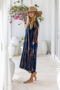 womens mid length oversize tie dye dress in navy blue and brown featuring a hand beaded v neckline, 3/4 length sleeves and pockets