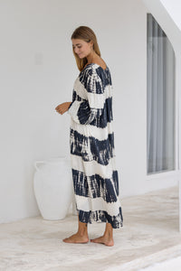 tie dye oversize dress in black and cream featuring tie detail, side pockets and long sleeves