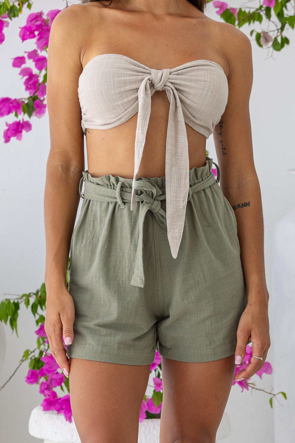 Womens super soft, 100% cotton high waited Paperbag shorts in khaki, featuring an elasticated waist with a belt and side pockets
