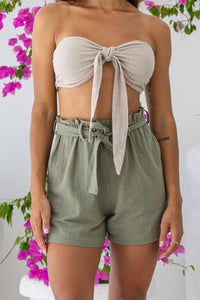 Womens super soft, 100% cotton high waited Paperbag shorts in khaki, featuring an elasticated waist with a belt and side pockets