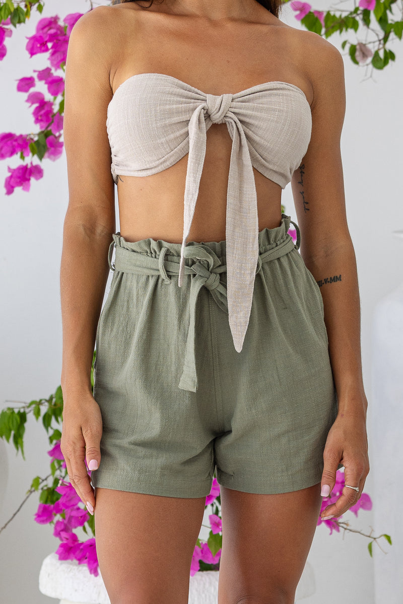 Womens super soft, 100% cotton high waited Paperbag shorts in khaki, featuring an elasticated waist with a belt and side pockets
