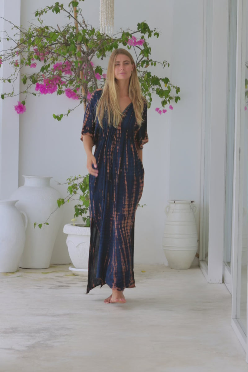 womens oversize maxi length tie dye kaftan in ink black and featuring a hand beaded neckline, pull tie detail and side pockets


