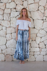 Womens tie dye skirt in navy blue and white featuring a smocked waist and button down front closing