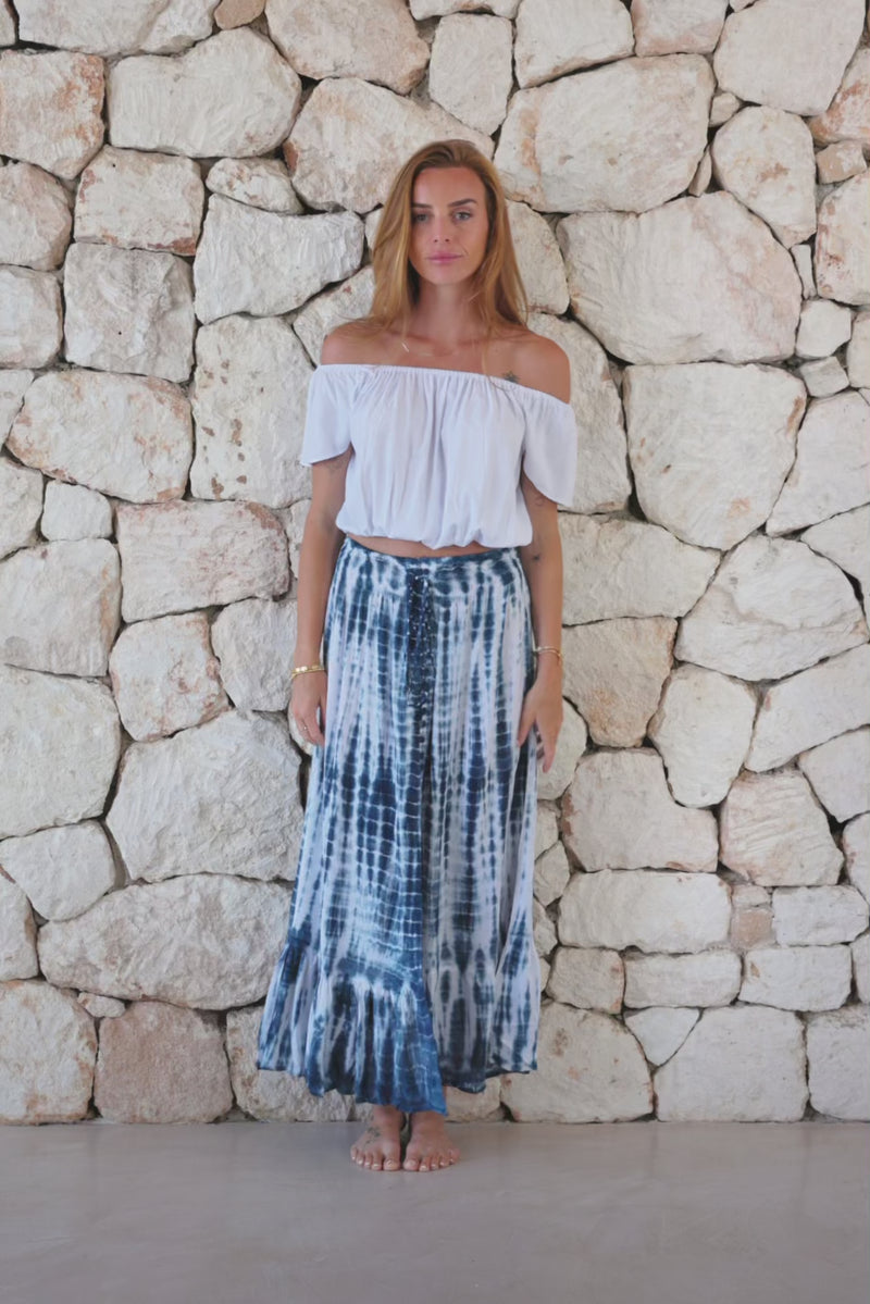 Womens tie dye skirt in navy blue and white featuring a smocked waist and button down front closing