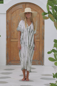 Womens mid length oversize tie dye kaftan in khaki and cream featuring a hand beaded neckline, short sleeves and pockets