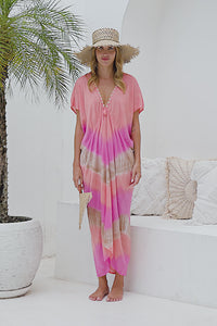Womens Sadie tie dye boho kaftan dress in pink. Handmade in Bali in soft lightweight rayon with hand beaded details. 