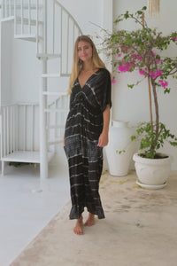 womens oversize maxi length tie dye kaftan in ink black and featuring a hand beaded neckline, pull tie detail and side pockets

