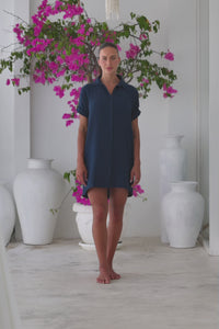 Womens super soft, 100% cotton Riley Shirt Dress in navy blue with button down fastening, side pockets and 3/4 length sleeves with turn-up detail 