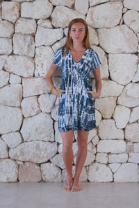 Relaxed, super soft, lightweight, short length tie dye dress in navy and white featuring a v neckline, pull tie detail and side pockets