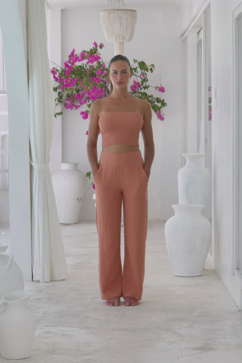 Womens stylish, super soft 100% cotton Rachel Trousers in brick, featuring an elasticated waist and pockets for a flattering and comfortable fit