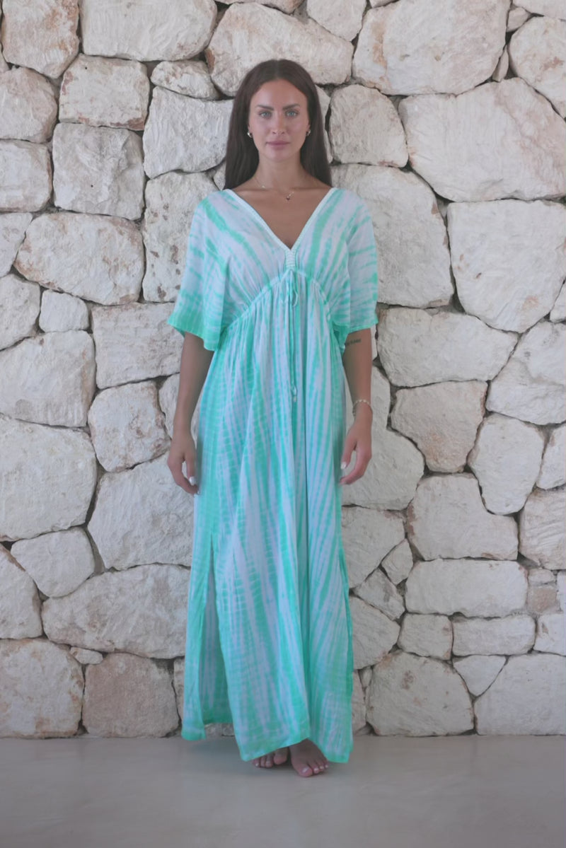 Womens overisze maxi length tie dye kaftan in aqua blue featuring a hand beaded neckline and pull tie detail