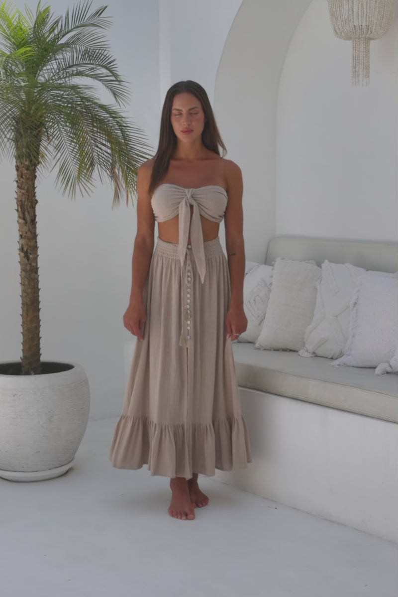 Womens super soft, comfortable and flattering Lorena Skirt in beige featuring a smocked waist and button down front closing