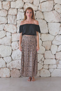 Womens stylish, lightweight and super soft long length skirt in leopard print featuring an elasticated waist at the back and front/side split