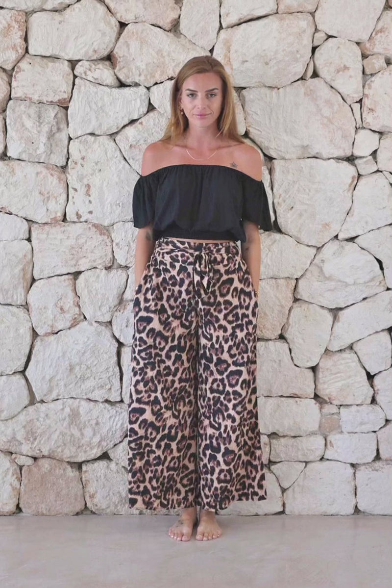 Stylish, super soft wide leg culotte style trousers in big leopard print featuring an elasticated waist, belt detail and pockets for a flattering and comfortable fit