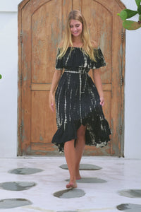 womens mid length tie dye dress in black featuring an off the shoulder frill, elasticated waist, detachable belt and side pockets