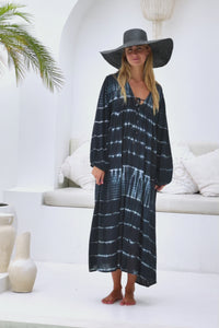 tie dye oversize dress in black and cream featuring tie detail, side pockets and long sleeves
