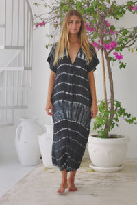 Womens mid length oversize tie dye kaftan in black featuring a hand beaded neckline, short sleeves and pockets