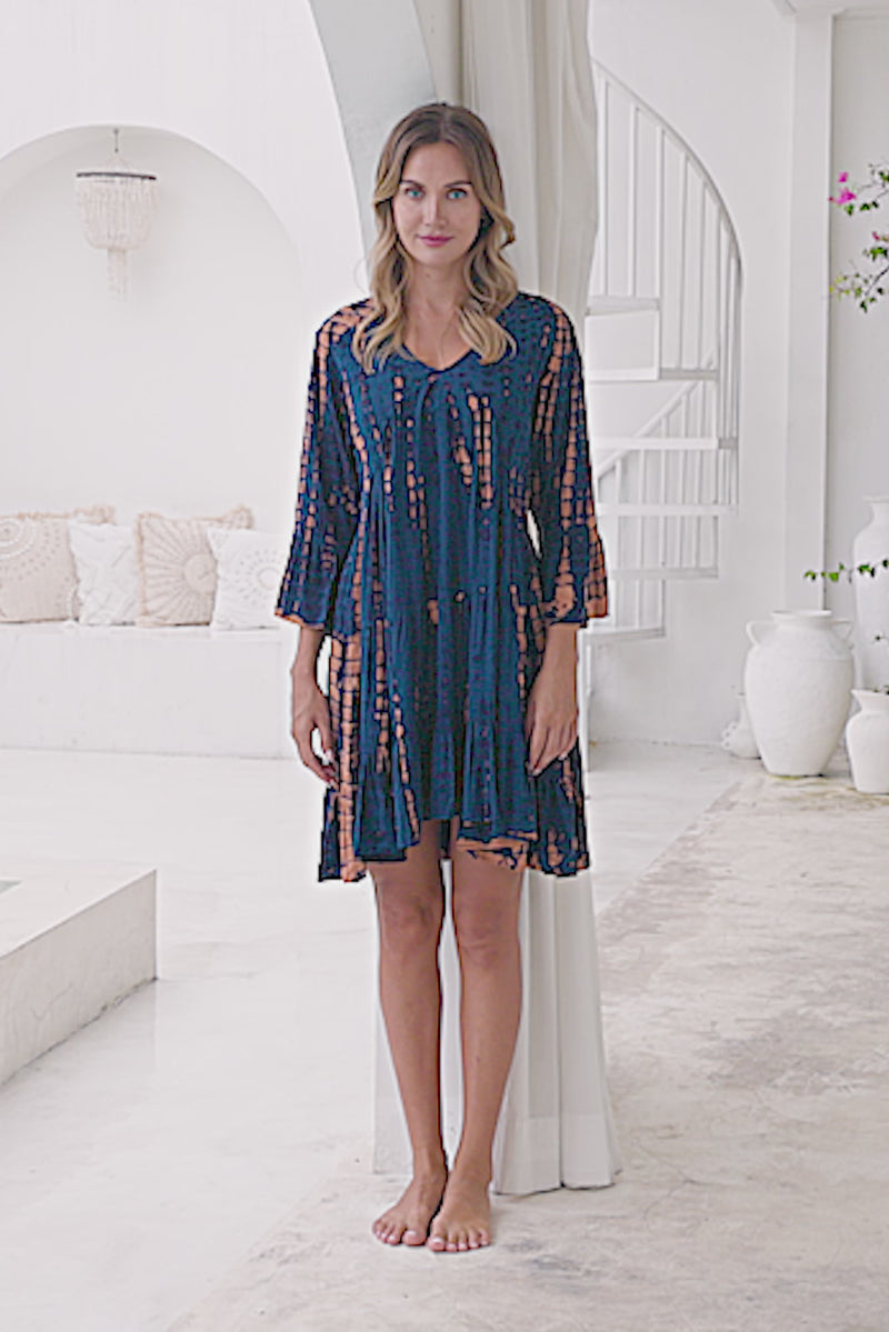 Womens Frida short smock dress in navy and copper tie dye, in soft lightweight rayon with discreet side pockets and 3/4 trumpet sleeves