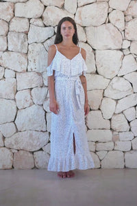 Womens elegant long length dress in white polka dot featuring cold shoulder sleeves, an elasticated waist, detachable belt detail and frill detailing 