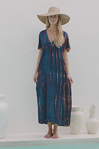 Womens Nadia Maxi Dress in navy and copper tie dye finish, in soft lightweight rayon, with side splits, pockets and hand beaded detailing.