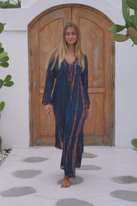 womens full length tie dye summer dress in black featuring a hand beaded v neckline, pull ties under the bust, trumpet sleeves, pockets and side splits