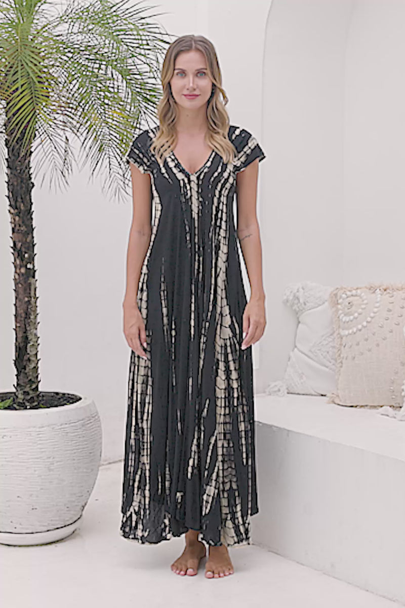 Womens Aria Maxi Dress in black tie dye, soft lightweight rayon with pockets, a detachable belt and hand beaded detailing.