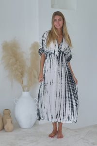 Womens mid length tie dye dress in cream featuring a hand beaded neckline, kimono sleeves, elasticated waist and pockets