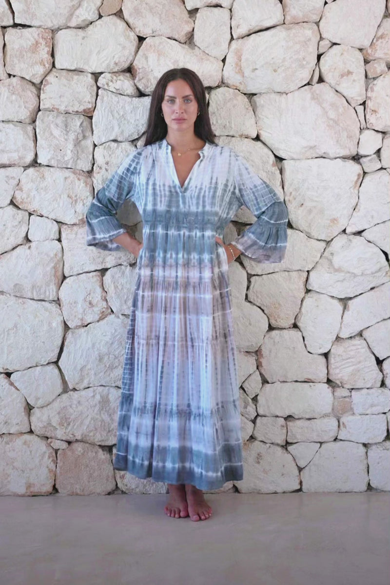 Womens super soft, lightweight, tunic style long length tie dye dress in light grey featuring 3/4 length trumpet sleeves and side pockets