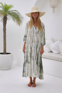 womens mid length tie dye tiered tunic dress in khaki and cream featuring a v neckline, long sleeves and side pockets