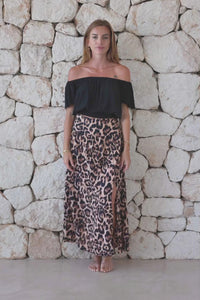 Womens stylish, lightweight and super soft long length skirt in big leopard print featuring an elasticated waist at the back and front/side split