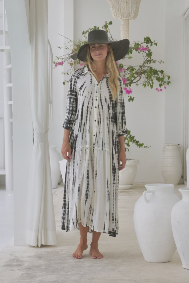 Womens button up mid length tie dye dress in cream featuring a tiered silhouette, 3/4 length sleeves and pockets 