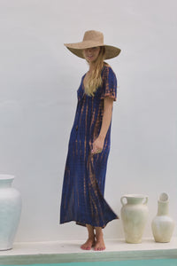 womens full length tie dye summer dress in black featuring a hand beaded v neckline, pull ties under the bust, short sleeves, pockets and side splits