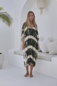womens mid length oversize tie dye dress in black and cream featuring a hand beaded v neckline, 3/4 length sleeves and pockets