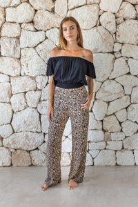 Womens trousers in leopard print featuring an elasticated waist and pockets 