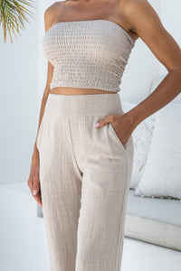 Womens stylish, super soft 100% cotton Rachel Trousers in beige, featuring an elasticated waist and pockets for a flattering and comfortable fit