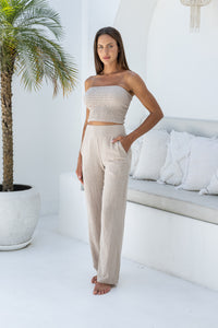 Womens stylish, super soft 100% cotton Rachel Trousers in beige, featuring an elasticated waist and pockets for a flattering and comfortable fit