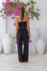 Womens stylish, super soft 100% cotton Rachel Trousers in black, featuring an elasticated waist and pockets for a flattering and comfortable fit